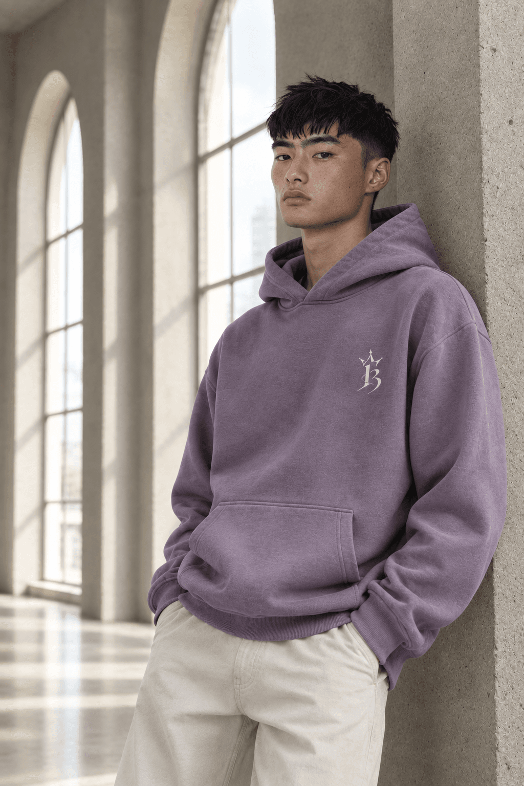 LOV3 model wearing a hoodie with the LOV3 logo